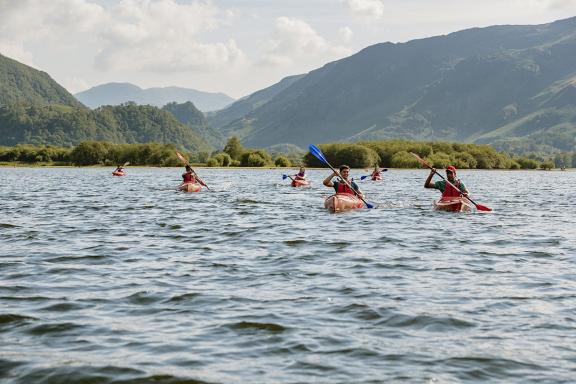 people in canoes