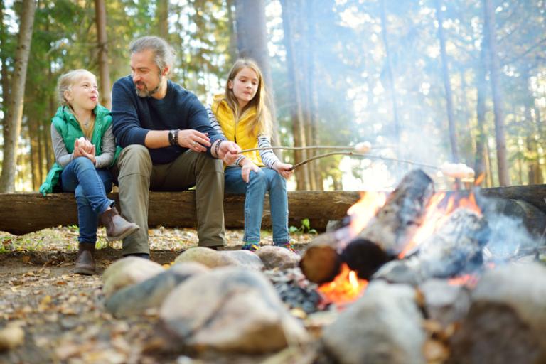 Family round campfire